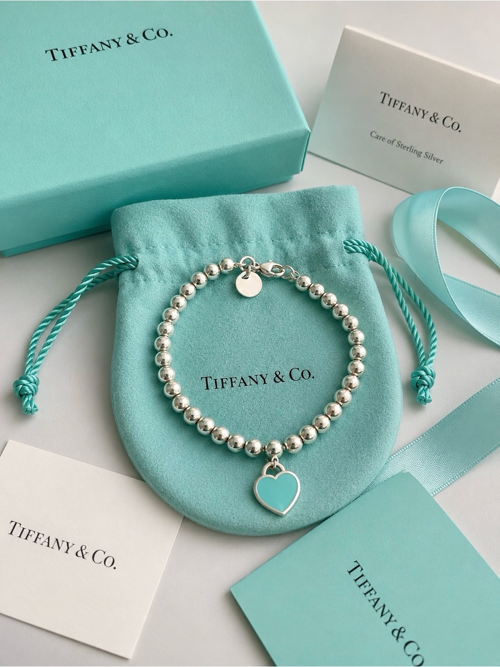 Authentic Tiffany & Co. Return to Tiffany Mini Blue Heart Tag Bead Bracelet 7”